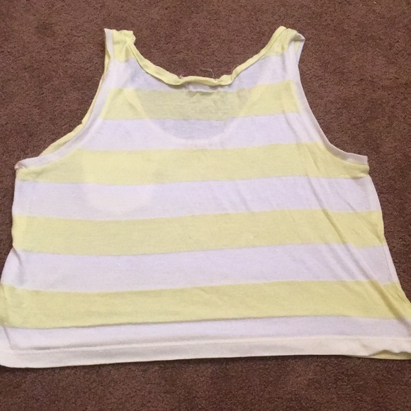 A white and yellow striped tank top with shark. - Picture 3 of 3